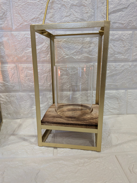 Photophore design en métal doré avec plateau bois